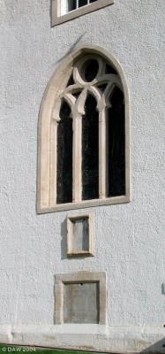 15th Century Church Window
This window at the rear of Neilston Parish Church is thought to date from the 15th century although the present building was built in 1763.  The stained glass comemorates those who lost their lives in the 1914-19 war.
