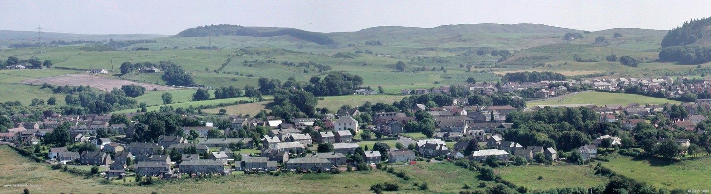 Neilston from the Fereneze Hills
Taken in 2005, Neilston Parish Church is in the centre of the photo, the Neilston Pad is in the top right hand corner.  [url=http://www.streetmap.co.uk/streetmap.dll?G2M?X=247685&Y=658585&A=Y&Z=3/]Map location[/url]
