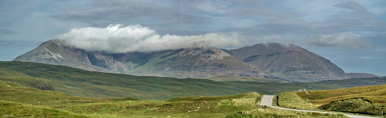 Looking towards the An Teallach mountains
The highest peak, Bidein a Ghlas Thuill, at 1062m is obscured by the early morning cloud.  [url=www.multimap.com/map/browse.cgi?lat=57.7583&lon=-5.1209&scale=25000&icon=x/]Map location.[/url]


