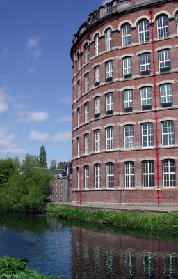 The Anchor Mill, May 2005
The west corner of the Anchor Mill part way through its restoration project.  The outside of the building appears completed but work continues inside.  The river Cart flows past the mill, the building in the distance is the WaterMill Hotel.
