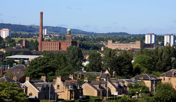 Anchor Mill, Paisley
A view of the Anchor Mill from the top of Barshaw Park in Paisley.  Built in 1886 the lower building on the right was the domestic finishing Mill that sits at the Hammils on the River Cart.  The building on the left with the chimney is the Mile End building.  When the mill was operating there were other buildings stretching between these two.
