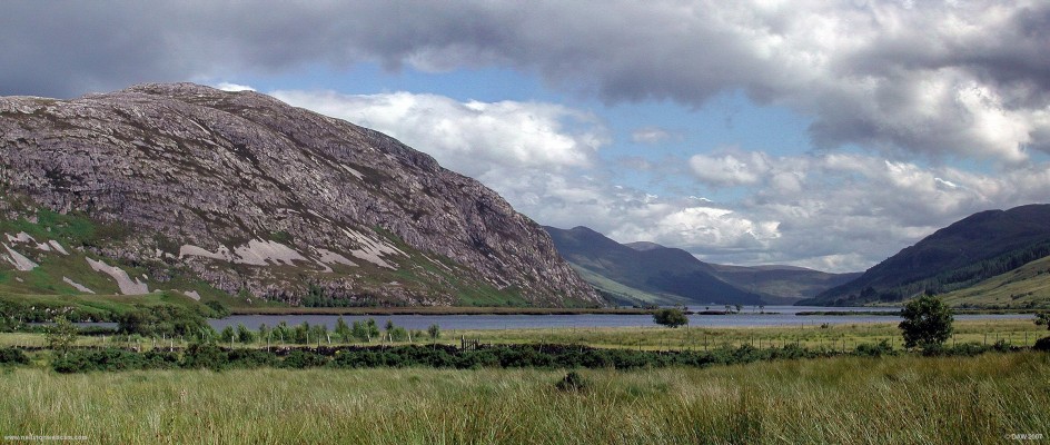 Ben Screavie
The rugged slopes of Ben Screavie rise to 332m on left with Loch nan Ealachan in foreground and Loch More in the distance.  [url=www.multimap.com/map/browse.cgi?lat=58.3131&lon=-4.9128&scale=25000&icon=x/]Map location[/url]
