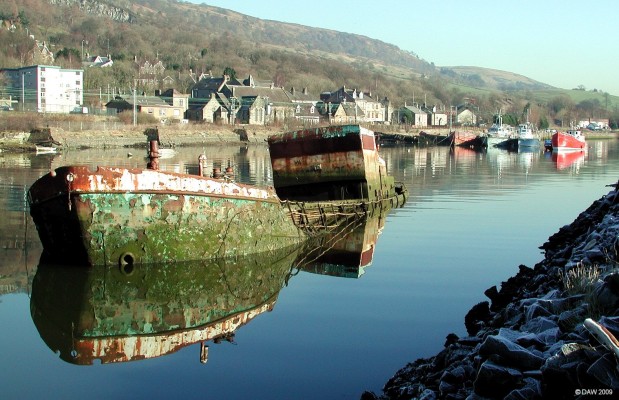 Bowling Harbour, Winter
A cold but bright winter afternoon at Bowling Harbour.  In days gone by this would have much busier with the entrance to the Forth & Clyde Canal being at the opposite end of the harbour.  The Canal is once again fully open but not used for cemmercial traffic as it would have been when this harbour was constructed.  [url=http://www.streetmap.co.uk/map.srf?X=244457&Y=673595&A=Y&Z=115/] Map location. [/url]
