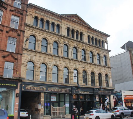 Britannia Panoptican Music Hall building, Glasgow, 2018
Built in 1857, the date is carved in stone at the top of the building.  Today the secret of what lies within is well hidden.  It is the oldest intact music hall left in the UK.   When in use it  had a central entrance where the amusement shop is now.  The building is catagory A listed and the music hall is in the hands of a [url=http://www.britanniapanopticon.org/] trust. [/url].  [url=http://www.streetmap.co.uk/map.srf?X=259412&Y=664954&A=Y&Z=110/] Map location. [/url]
