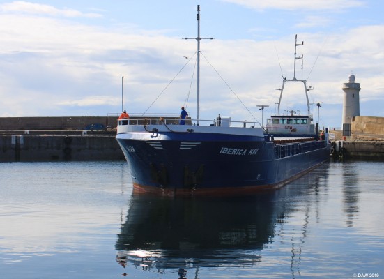 Tight squeeze, Buckie Harbour
Cargo vessel Iberica Hav squeezes in to Buckie harbour, its not the breadth that's the issue but at 89m in length it takes up the entire side of the harbour.  They made it look easy though.
