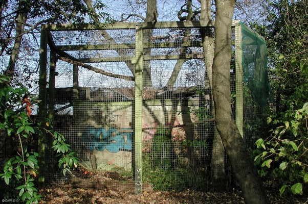 Cage, Calderpark Zoo, 2007
The Zoo may have closed, but there are still lots of animals here.  Mainly of the small two legged variety with spray cans.
