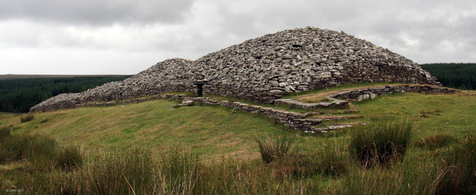 The Grey Cairns of Camster
One of the most impressive examples of a chambered Cairn you will see anywhere in Scotland. It dates from around 5,000 years ago at a time when the land here was more fertile.  There are two chambers in the 60m length of the Cairn.  It is thought they started as two separate round Cairns and were joined at some point. [url=http://streetmap.co.uk/map.srf?X=326043&Y=944215&A=Y&Z=115/] Map location. [/url]

