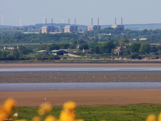 Chapelcross Power Station, Dumfries & Galloway
A view of Chapelcross from the English side of the Solway Firth.  Built in 1959 it was the second Magnox Nuclear Power Station after Calderhall in England.  It operated between 1959 and 2004, the cooling towers have already been demolished and the rest of the site is in the process of being decommissioned.  The primary purpose of Chapelcross was to produce weapons grade Plutonium for the UK's nuclear weapons programme, generating electricity was a by-product.
