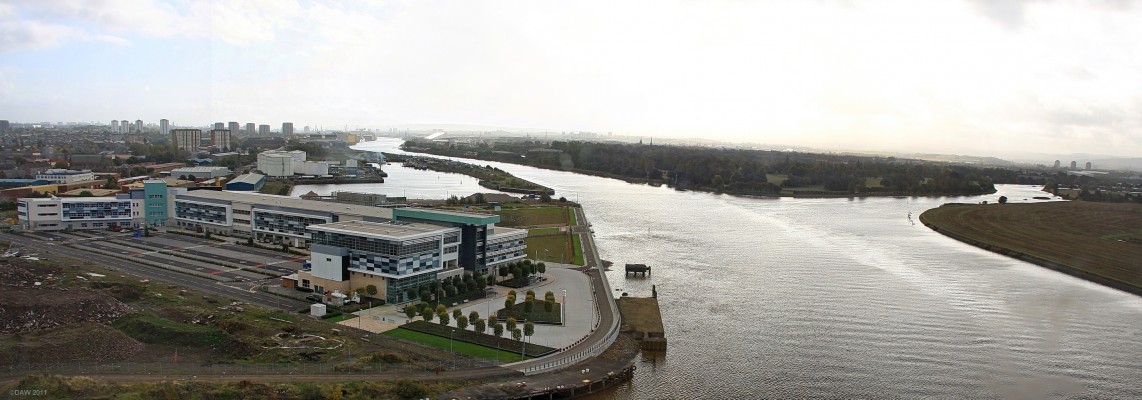 Clydebank College
Looking up river from the top of the Titan Crane in Clydebank.  The college stands where the main slipways were in John Browns Shipyard.  This is where some of the great Cunard liners such as Queen Mary were launched from.  The slip way was lined up with the river Cart on the opposite bank to give more room for large ships.
