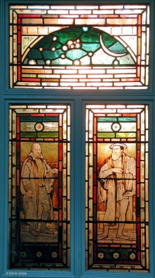 Coats Observatory stained glass
The entrance door to Coats Observatory.  The morning sun is shining through a window at the rear of the building, illuminating the stained glass door.  The gentleman on the right is Kepler who postulated ahead of his time that the planets revolved around the sun.  Galileo, on the left, is a name most people will recognise.
