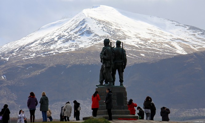 The Commando Monument, Spean Bridge
The three Commandos appear to fix their gaze on the distant mountains of Nevis Range as the latest bus load of tourists scurry around below.  If you look close you can see the ski tows on the snow covered mountains.  [url=http://www.streetmap.co.uk/map.srf?X=220664&Y=783018&A=Y&Z=126&ax=220704&ay=783078/] Map location. [/url]
