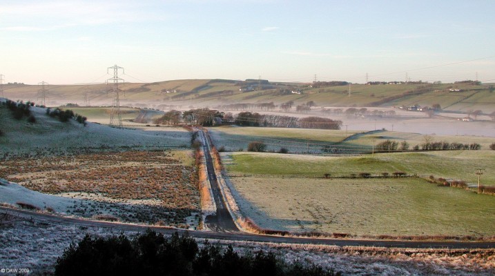Looking towards Corkindale Law
A layer of freezing fog is creeping up the valley towards Uplawmoor in this view taken from the top of the old Quarry above Neilston.  If you follow the line of the road the hill in the distance is Corkindale Law with a height of 259m.  [url=http://www.streetmap.co.uk/map.srf?X=247197&Y=655678&A=Y&Z=120/] Map location. [/url]
