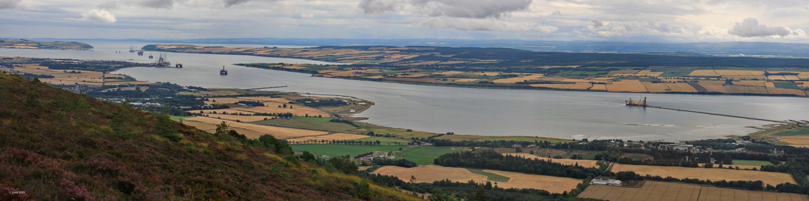 The Cromary Firth
A view over the Cromarty Firth from the Fyrish Monument above Alness.  This natural harbour has been used in the past by the Royal Navy to anchor the "Home Fleet" but today is used as a safe anchorage for out of service oil rigs or ones awaiting repair.  [url=http://streetmap.co.uk/map?X=260815&Y=869750&A=Y&Z=120/] Map location. [/url]
