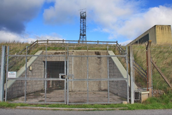 Cultybraggan former RGHQ bunker
The entrance to the former Regional Government cold war bunker at Cultybraggan camp.  It consisted of a 2 level structure with the lower level being underground.  It was intended to house the members of the Scottish Office in the event of a Nuclear war.  It had a filtration system, generators, radio broadcast room, communications and dormatories.  It was built at a cost of £30m and completed in 1990 but never used.  Today it is owned and used by an Internet provider.  
