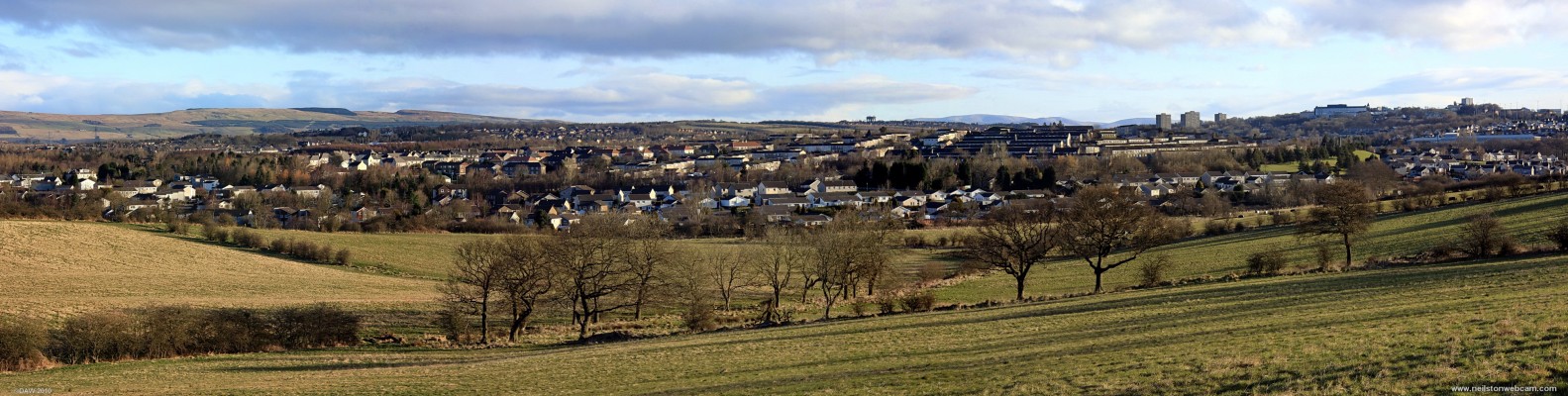 Panoramic view over Cumbernauld
Designated as Scotland's third New Town in 1956 it has grown since then to a population of well over 50,000.  It was built as a series of satellite communities with the main town centre on top of the hill towards the right hand side of this photo.  [url=http://www.streetmap.co.uk/map.srf?X=273475&Y=671995&A=Y&Z=120/] Map location. [/url]
