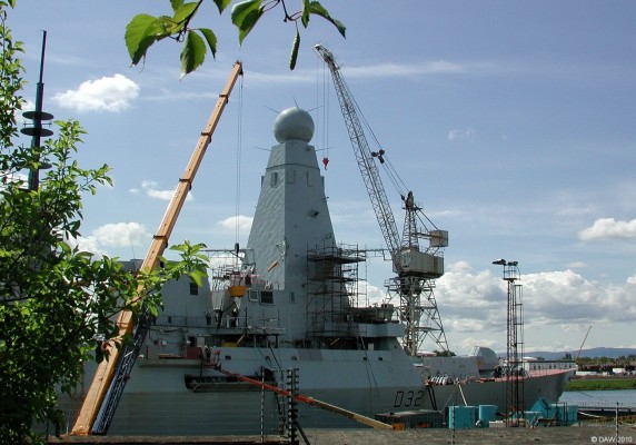 HMS Daring, BAE Systems, May 2007
HMS Daring, the first of 6 new type 45 Anti-Air warfare destroyers being built for the Royal Navy seen here at BAE Systems at Scotstoun..  There were supposed to be 12 then it was 8 and now it is 6, just how effective such a small batch of ships will be remains to be seen. [url=http://www.streetmap.co.uk/map.srf?X=251762&Y=668257&A=Y&Z=115/] Map location. [/url]
