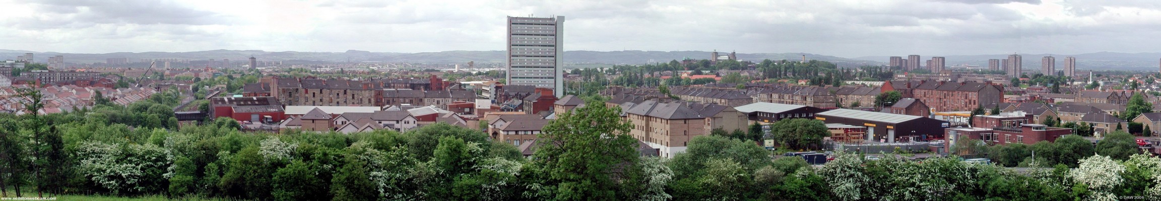 Looking south from Dawsholm Park
This view is dominated by the Anniesland cross tower block, to the left on the horizon you can see the familiar outline of the Neilston Pad.  The Forth & Clyde Canal runs behind the tree line in the foreground. [url=http://www.multimap.com/map/browse.cgi?lat=55.8972&lon=-4.3159&scale=25000&icon=x/]Map location[/url]
