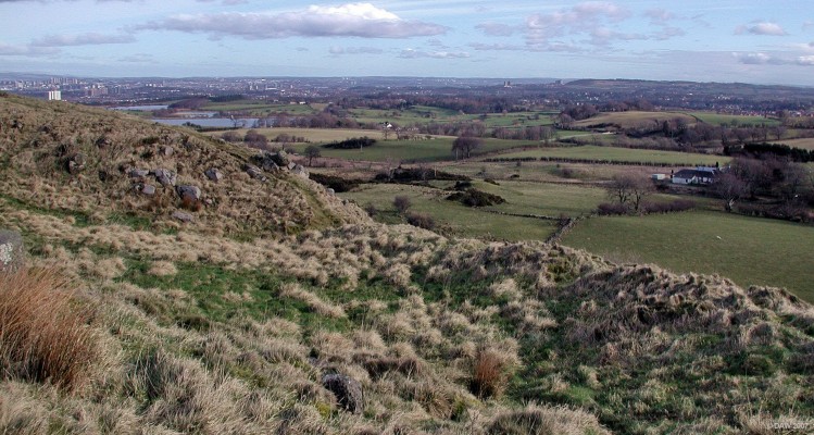 Hill Fort, Duncarnock Hill
Duncarnock Hill, or The Cragie as it is more commonly known, has the remains of an Iron Age fort on it.  These forts consisted mainly of earth works which means there isn't a great deal left to see after a few thousand years of erosion and other activity.  This photo shows a grass mound along the eastern side of the hill.  On the horizon on the right hand side are the Cathkin Braes. [url=http://www.streetmap.co.uk/streetmap.dll?G2M?X=250130&Y=655935&A=Y&Z=3/]Map location[/url]
