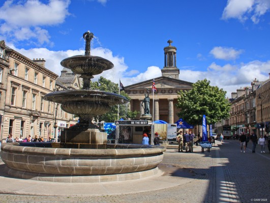 Elgin Town Centre
A view along High Street in the centre of Elgin.  St Giles church is in the background.  [url=http://streetmap.co.uk/map?X=321530&Y=862834&A=Y&Z=110/] Map location. [/url]
