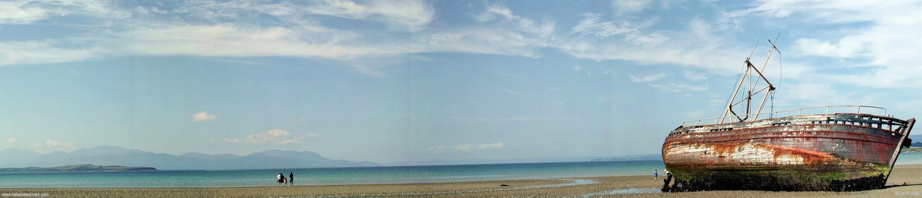 Ettrick Bay, Isle of Bute
A near perfect day at Ettrick day, the mountains of the Isle of Arran are in the distance, the smaller Island of Inchmarnock can be seen on the left hand side.  [url=http://www.streetmap.co.uk/streetmap.dll?G2M?X=203680&Y=666105&A=Y&Z=3/]Map location. [/url]
