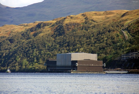 The explosives handling jetty at Coulport as seen from Ardentinny
This jetty was built for the Royal Navy's Vanguard class Missile submarines to enable Trident missiles to be loaded under cover.  The last 2 at sea missile tests by the Royal Navy both failed for different reasons. [url=http://www.streetmap.co.uk/map?X=218785&Y=687620&A=Y&Z=115&ax=218785&ay=687620/] Map location. [/url]
