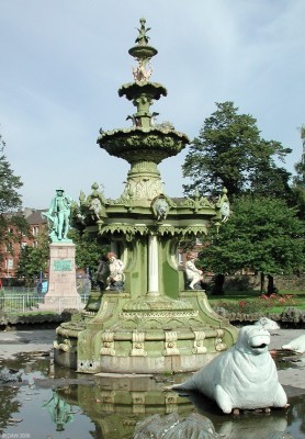 Fountain Gardens, Paisley
Paisley's oldest public park, gifted to the Town by Thomas Coats in 1868.  The fountain was made by George Smith & Co of Glasgow and stands 8.5 metres high, when working the central jet of water rose another 9 metres into the air.  The life size walruses are an unusual feature.  The bronze statue of Robert Burns in the back ground was unveiled in 1896. [url=http://www.streetmap.co.uk/map.srf?X=248066&Y=664582&A=Y&Z=115/] Map location. [/url]
