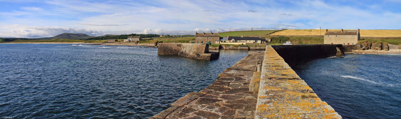 Fresgoe Harbour, Caithness
Looking back from the end of the sea wall at Fresgoe Harbour, sandside bay is on the left.  [url=http://streetmap.co.uk/map.srf?X=295868&Y=966092&A=Y&Z=115] Map location. [/url]

