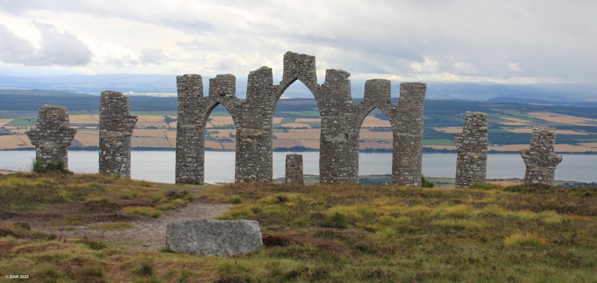 The Fyrish Monument, near Alness
Built in 1782 by Sir Hector Munro to give the locals work after they had been cleared off the land to make way for sheep.  It represent the Gate of Negapatam, a port in India which General Munro took for the British in 1781.  It is said General Munro rolled stones back down to the bottom to extend the duration of the work.  [url=http://streetmap.co.uk/map?X=260791&Y=869725&A=Y&Z=120/] Map location. [/url]
