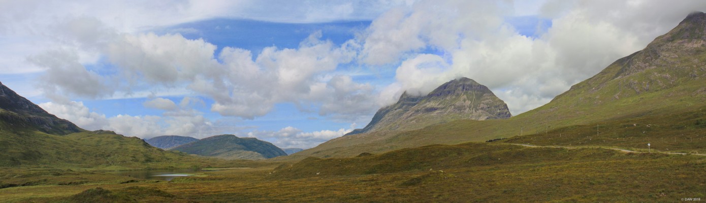 Glen Torridon
Looking West along Glen Torridon, Spidean a Choire Leith and Mullach an Rathain on the right both rise to just over 1000m.  Loch Bharanaichd on the left is almost invisible due to the reflected hills.  [url=http://www.streetmap.co.uk/map.srf?X=196991&Y=857546&A=Y&Z=126&ax=198131&ay=857946/] Map location. [/url]
