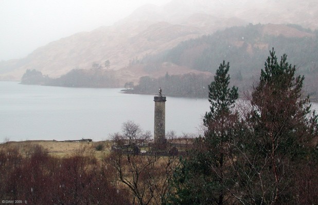 The Glenfinnan Monument in winter
Taken during a snow flurry.  The Monument was erected to commemorate all the clansmen who fought during the 1745 rebellion.  This is where Bonnie Prince Charlie first raised the Jacobite standard on 19th August 1745.  [url=http://www.streetmap.co.uk/map.srf?X=190599&Y=780756&A=Y&Z=115&ax=190787&ay=780756/] Map location. [/url]
