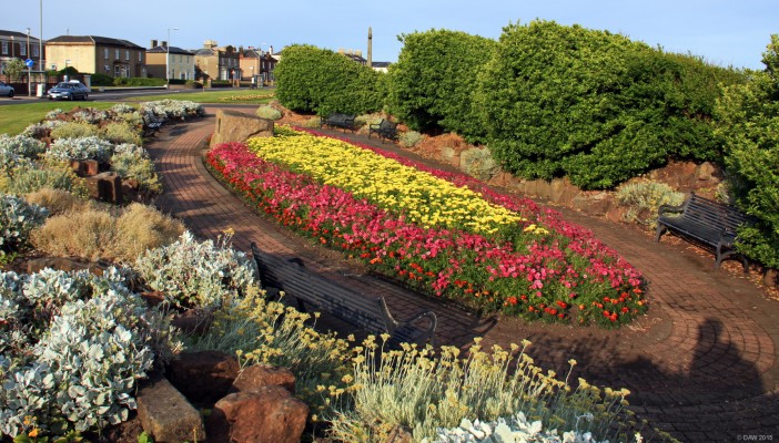 HMS Dasher memorial garden, Ardrossan
This boat shaped flowerbed on the seafront at Ardrossan commemorates the 379 men who lost their lives on the 23rd of March 1943 when the light escort carrier HMS Dasher blew up and sank south of the wee Cumbrae in the Firth of Clyde.
