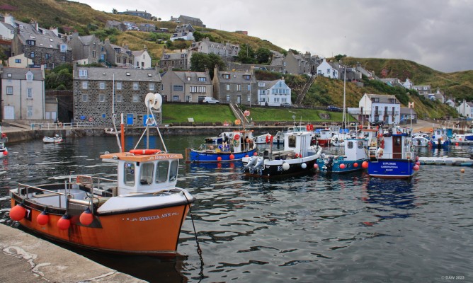 Gardenstown Harbour, Aberdeenshire
A view of the harbour area at the village of Gardenstown.  [url=http://streetmap.co.uk/map?X=379932&Y=864897&A=Y&Z=115/] Map location. [/url]
