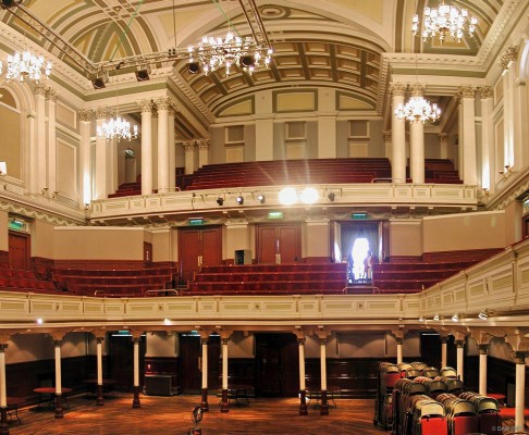 The view from the stage in Paisley Town Hall
Opened in 1882, 18 years after George Aitken Clark of the Anchor Mill had left �20,000 for its construction. His will stipulated that there should be a "reading and smoking room for the Lower Classes". The hall had a capacity of 2000 when built but due to modern fire regulations this has been reduced to 800.  The final cost of construction is thought to have been �100,000
