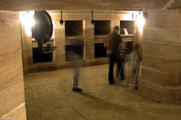 Inside the Crypt, Hamilton Mausoleum
Ghostly figures in the Crypt of Hamilton Mausoleum.  In 1852 the Duke had his Ancestors brought here from the church graveyard of Collegiate Church but in 1921 they were all re-buried in Bent Cemetery.  The Crypt has 28 single niches and 4 large corner spaces.  The original candle brackets can be seen hanging on the walls.  [url=http://www.streetmap.co.uk/map.srf?X=272662&Y=656440&A=Y&Z=120/] Map location. [/url]
