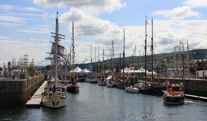James Watt Dock, Greenock, July, 2011
Taken during the tall ships event at Greenock in 2011.  The dockland is in the process of being reborn as a marina.  All these masts into the distance give an idea of what the busy port of Greenock might have looked like 150 years ago when large sail ships would have been a common sight. [url=http://www.streetmap.co.uk/map.srf?X=229747&Y=675709&A=Y&Z=115/] Map location. [/url]
