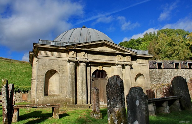 The Johnstone Mausoleum, Bentpath
This impressive Robert Adam designed Mausoleum is hidden away in a rural cemetery at Bentpath.  It was built for John Johnstone of Alva, for his father Sir James Johnstone of Westerhall (1726-94).   Note the Ox-skulls above the pillars. The building was restored in 1998 by Solway Hertitage.  [url=http://www.streetmap.co.uk/map.srf?X=331268&Y=590340&A=Y&Z=115/] Map location. [/url]
