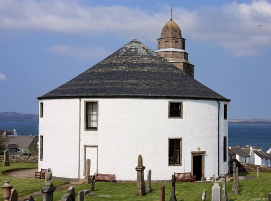 The round Church, Bowmore, Islay
Killarow Parish Church was built in 1767 by Daniel Campbell, the owner of Islay at the time.  It is said that it was made to be circular so there were no corners for the Devil to hide in.  [url=http://www.streetmap.co.uk/map.srf?X=131165&Y=659596&A=Y&Z=115/] Map location. [/url]
