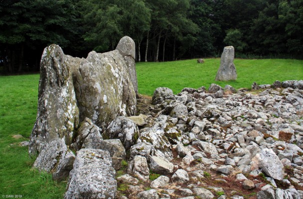 Loanhead Recumbant Stone, Daviot
The recumbent stone at the Loanhead stone circle.  Recumbent stone circles are only found in the north east of Scotland and date from the Neolithic period some 4000 to 5000 years ago.  The people who built and used the circle farmed the land around, tools and burials and been found in nearby fields.  The sites were thought to be used for religious purposes and for observing the changing seasons.
