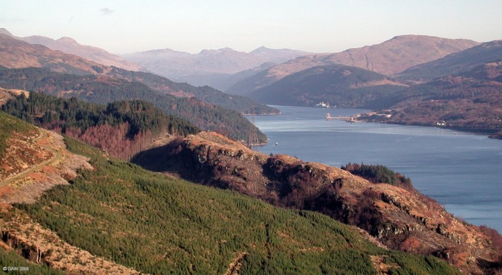 Loch Long and the Arrochar Alps
Looking up Loch Long on a bright February day.  You can just make out some patches of snow on the distant hills.  The oil tanks of the Finnart Oil Terminal can be seen on the right and RFA Fort Rosalie is berthed at the Glenmallan Jetty further up the loch. [url=http://www.streetmap.co.uk/map.srf?X=220052&Y=690899&A=Y&Z=115/] Map location. [/url]
