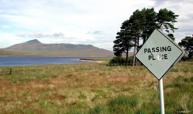 Loch an Ruathair, Sutherland
Over looking Loch an Ruthair with Meall a' Bhuirich rising to some 407m in the distance.  At least the locals seem to be making good use of the passing place signs for target practice.   [url=www.multimap.com/map/browse.cgi?lat=58.3025&lon=-3.9207&scale=25000&icon=x/]Map location[/url]
