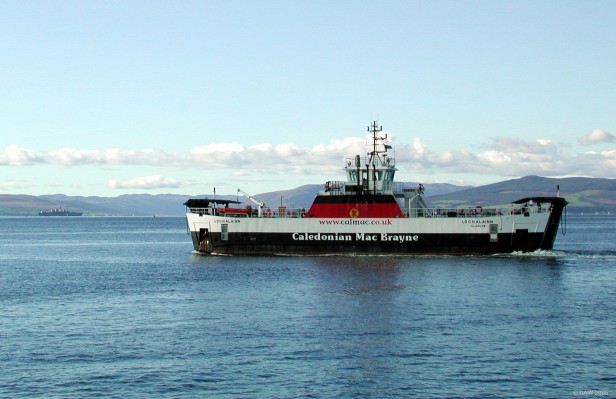 MV Loch Alainn heads out to the Cumbrae from Largs
MV Loch Alainn was built in 1997 by Buckie Shipbuilders.  She can carry up to 24 cars and 150 passengers.   One of the Royal Navy's Invincible class Aircraft Carriers can be seen in the background heading down river in the main shipping lane.
