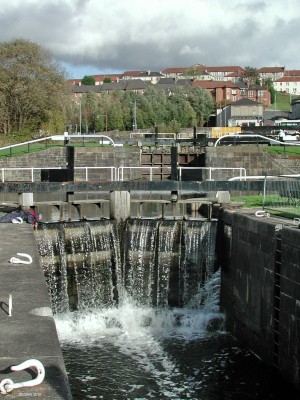 Maryhill Locks, Glasgow
Some of the 5 locks at Maryhill on the Forth & Clyde Canal.   In total there are 29 locks on its 35 mile length.  The top lock (21) takes the canal to its highest point on its journey across to the Forth.  [url=http://www.streetmap.co.uk/map.srf?X=256235&Y=669047&A=Y&Z=115/] Map location. [/url]
