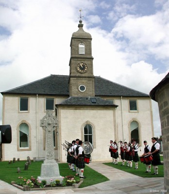 Neilston Parish [url=www.neilstonparishchurch.org.uk/]Church[/url], June 2004
After restoration to its former glory, the Pipe Band awaits the arrival of the Minister and Clergy for the rededication service after work was completed.
