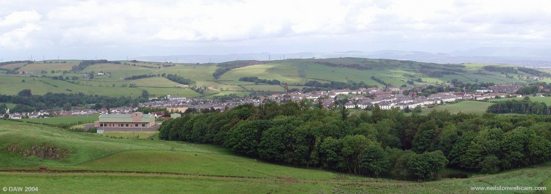 Overview of Neilston from The Pad
This view is taken from the Neilston Pad looking over towards the Fereneze Hills.  The building in the left foreground is the water treatment works for Neilston.
