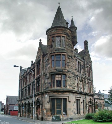 The old Fire Station, Paisley
This catagory B listed building has been vacant since the early 1990's.  It was purpose built in 1897 as a fire station, the vehicle doors can be seen along the front.  This photo was taken in 2006 when the building wasn't in great condition.  Reports say that Historic Scotland plan to revamp the building as part of a wider regeneration scheme.  [url=http://www.streetmap.co.uk/map.srf?X=248440&Y=663680&A=Y&Z=120/] Map location. [/url]
