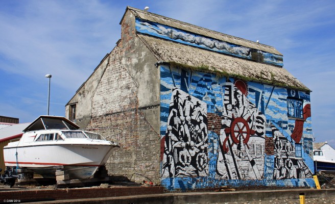 Old Smoke House, Mallaig
A mural of how life was in Mallaig in the past.  During the 1960's Mallaig was said to be the busiest Herring port in Europe. 
