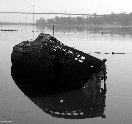 Wreck, Bowling Harbour
One of several old boat hulks that lie wrotting in Bowling Harbour.  The Erskine Bridge is in the background.  [url=http://www.streetmap.co.uk/map.srf?X=244713&Y=673620&A=Y&Z=115/] Map location. [/url]
