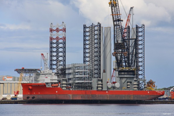 Pacific Orca, Cromarty Firth
Pacific Orca is a purpose built heavy lift jack-up vessel built for use in the offshore wind farm market.  It can carry and install up to 12 Wind Turbines.  At the time it was launched in 2012 she was the largest such vessel in the world.  This view is taken from across the water at Cromarty.  The Nigg Construction yard was originally built to manufacture the huge steel jackets used in the North Sea for oil production.  Today it is being used for constructing parts for offshore Windfarms.
