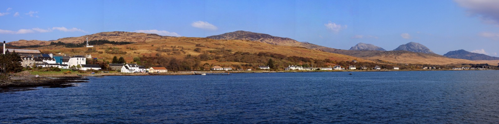 Over looking Craighouse from the Pier, Isle of Jura
With a population of only around 200 this is the largest population centre on the Island of Jura.  On the left is the Jura Hotel with the Jura Distillery behind it.  Jura's only shop is to the right of this next to the red roofed village hall.  The Paps of Jura can be seen in the distance on the right hand side.  [url=http://www.streetmap.co.uk/map.srf?X=153052&Y=667025&A=Y&Z=120/] Map location. [/url]
