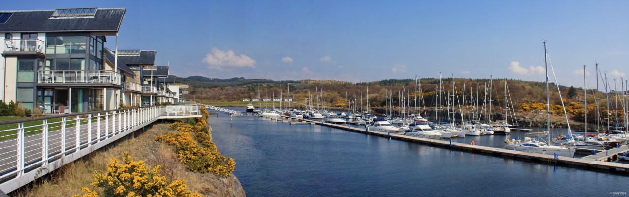 Portavadie Marina, Loch Fyne
Portavadie was built in 1975 as a construction yard for concrete oil platforms.  However, it quickly became apparent that stell was better and the yard and all its house lay derelect.  Eventually the housing was demolished and in 2010 the new marina complex was open that you see here.  [url=http://streetmap.co.uk/map?X=192665&Y=669339&A=Y&Z=115/] Map location. [/url]
